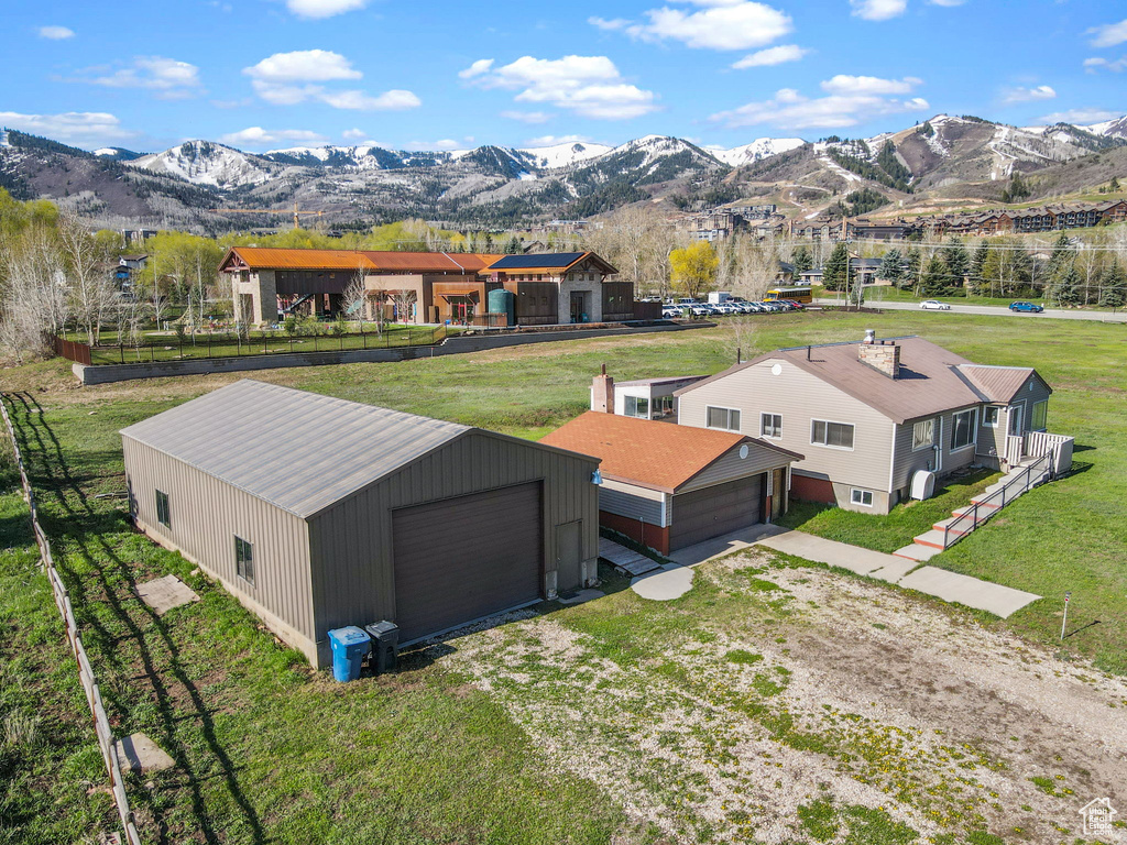 Birds eye view of property featuring a mountain view