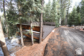 Exterior space featuring a forest view