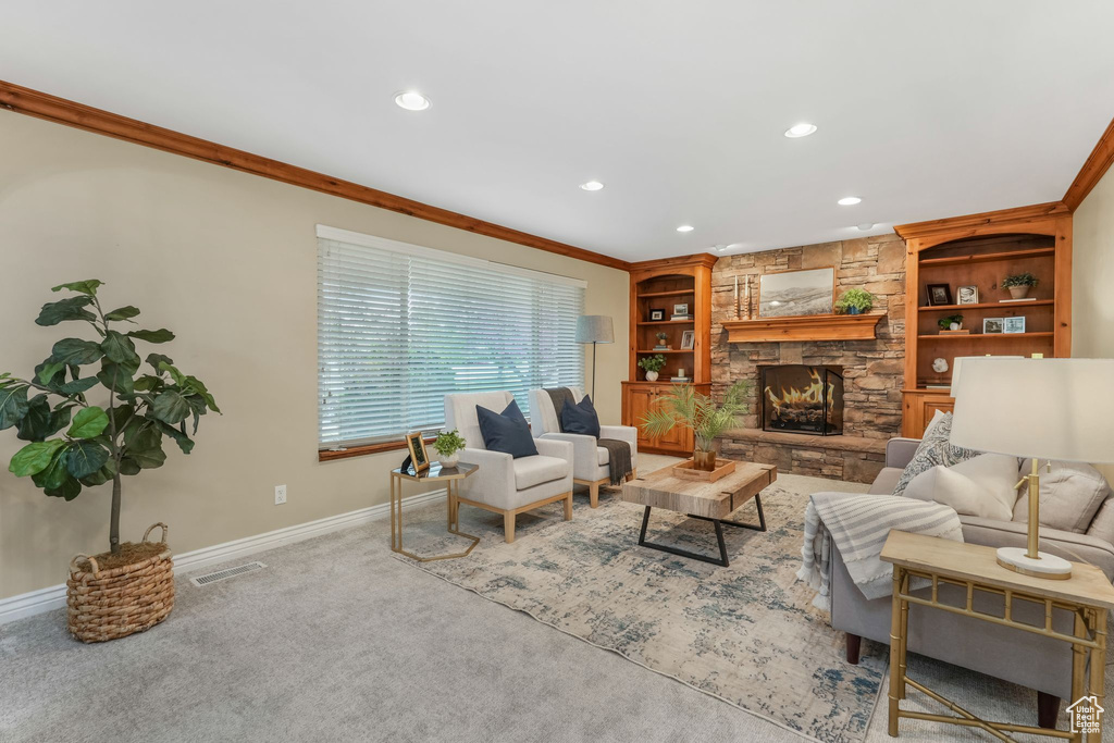 Living room with baseboards, recessed lighting, carpet floors, and visible vents