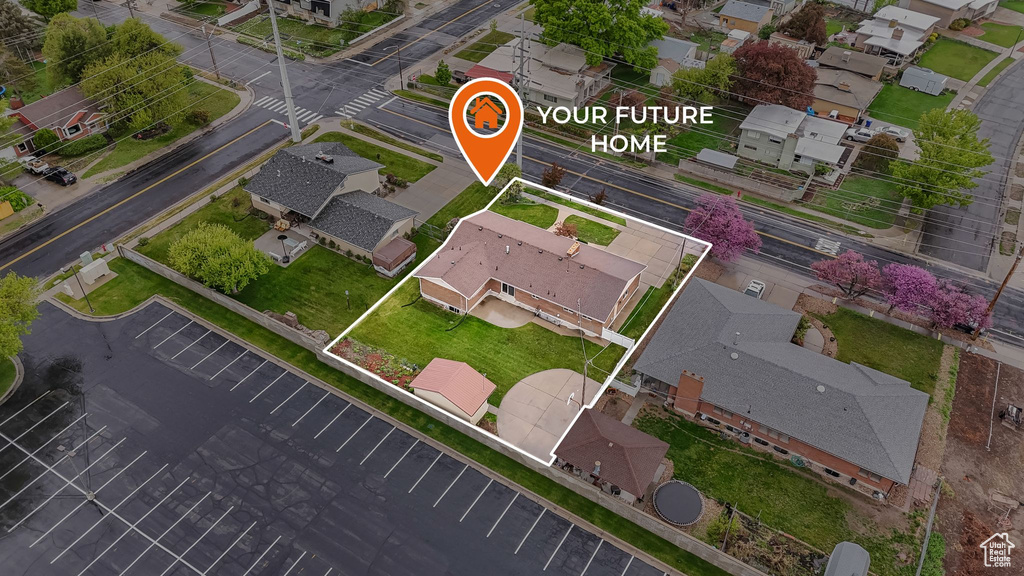 Birds eye view of property with a residential view