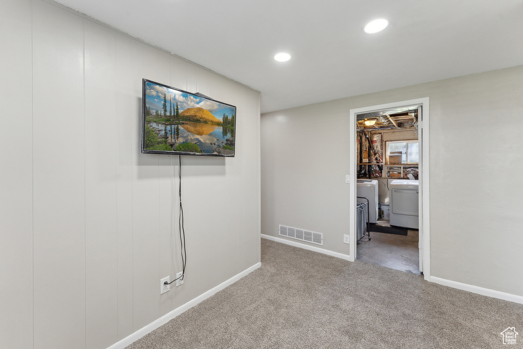 Interior space with separate washer and dryer, recessed lighting, baseboards, and visible vents