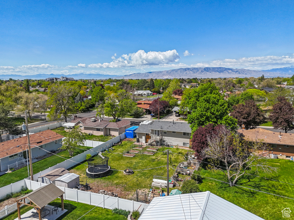 Drone / aerial view featuring a residential view and a mountain view