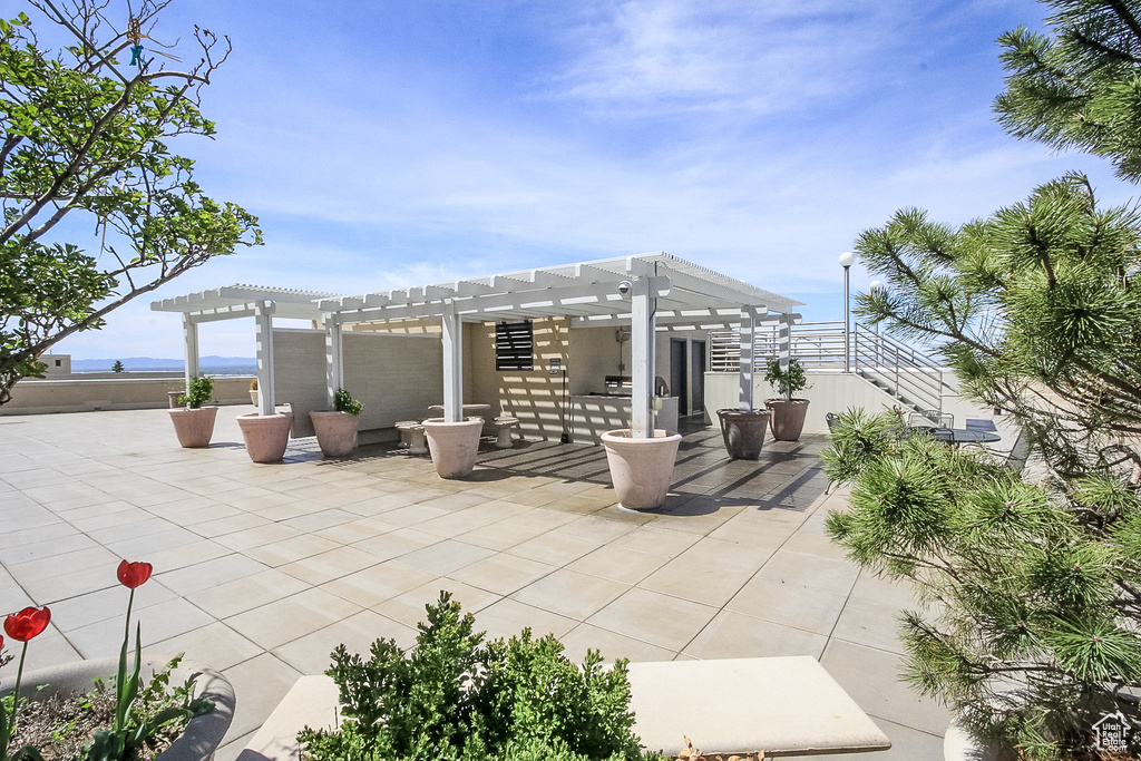 View of patio featuring a pergola