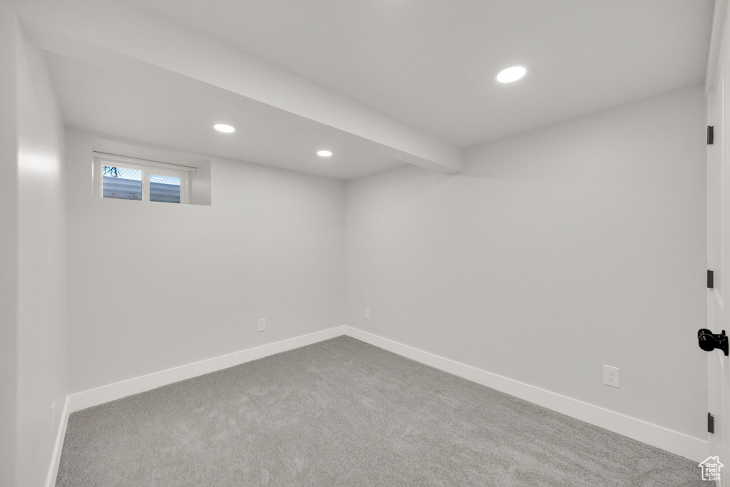 Basement with baseboards, carpet flooring, and recessed lighting