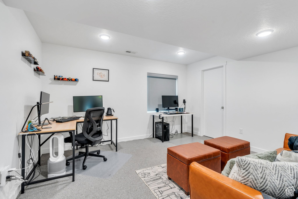 Office space featuring baseboards, carpet, recessed lighting, and visible vents