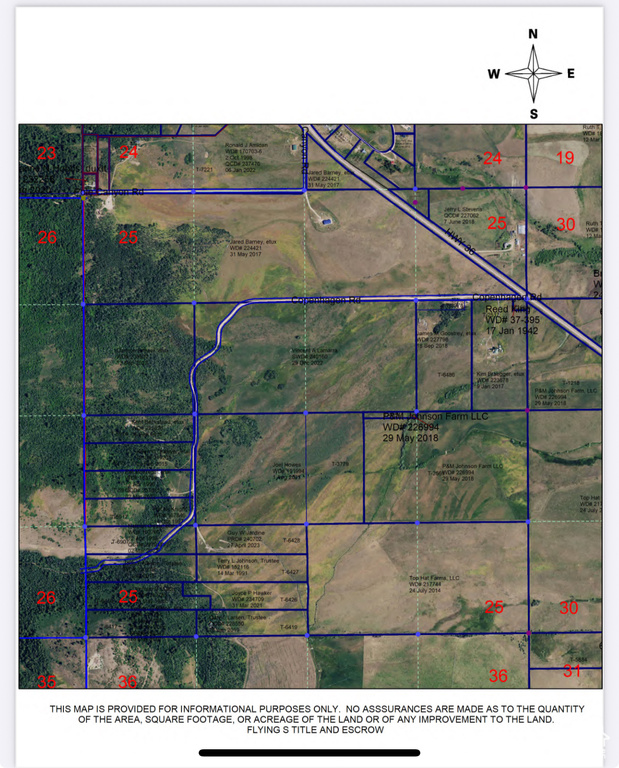 Aerial overview of property\'s location featuring property parcel outlined