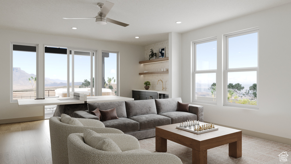 Living area featuring recessed lighting and a wealth of natural light