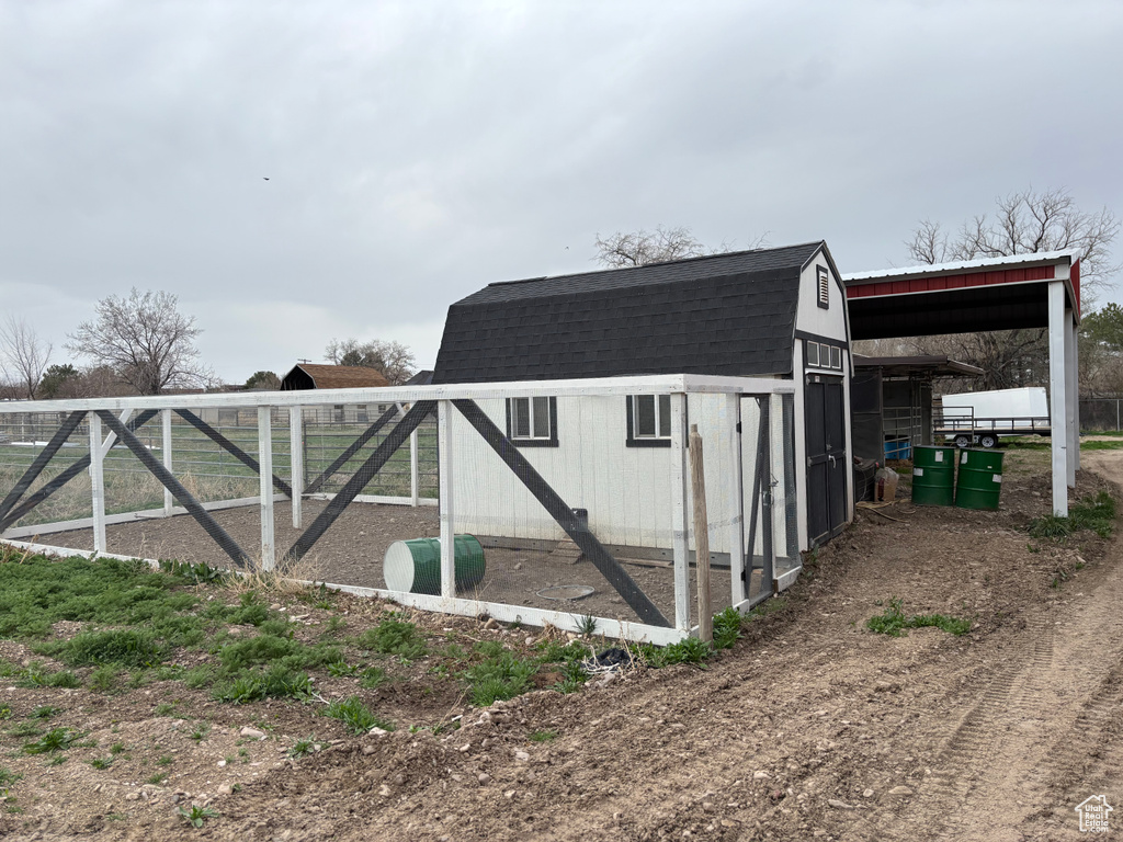 View of poultry coop with fence