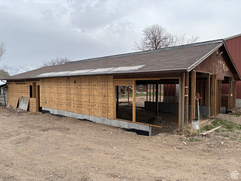 Exterior space with an outbuilding