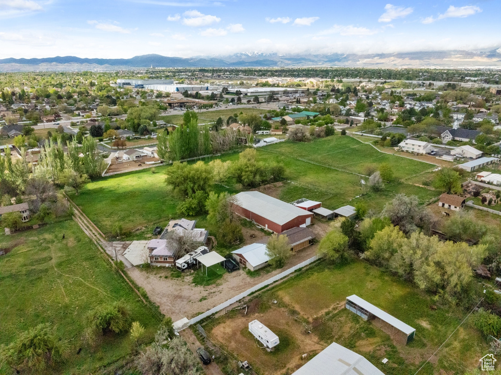 Drone / aerial view with a mountain view and a residential view