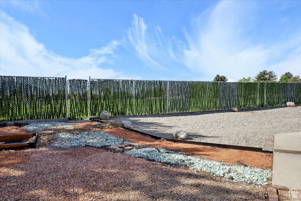 View of yard with fence