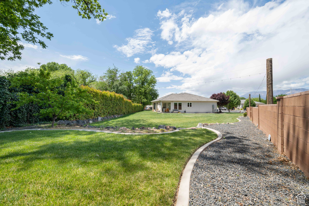View of yard with fence