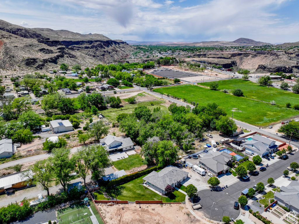 Birds eye view of property with a mountain view