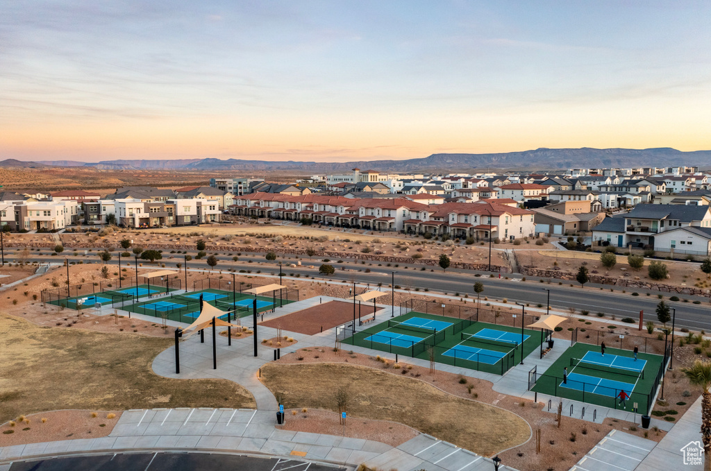 Birds eye view of property with a residential view and a mountain view