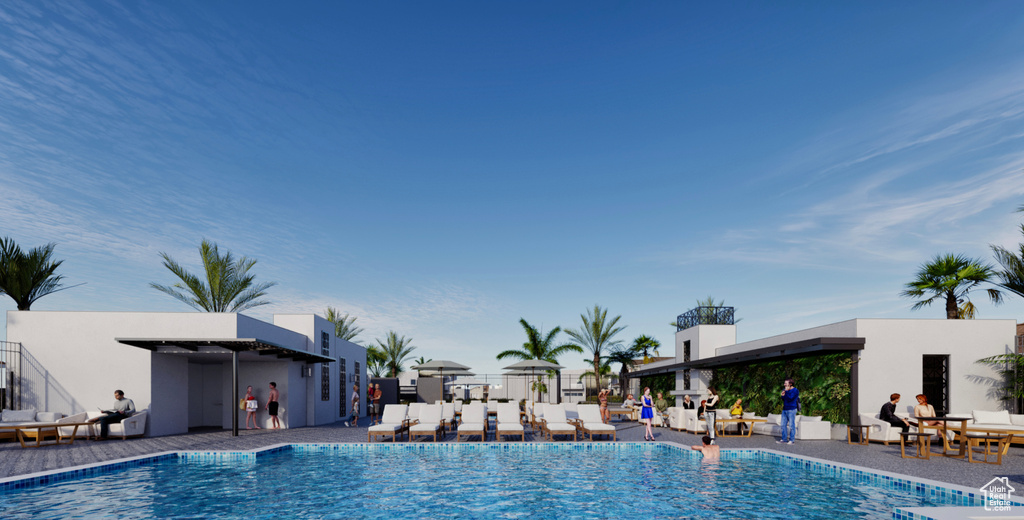 Community pool featuring a patio