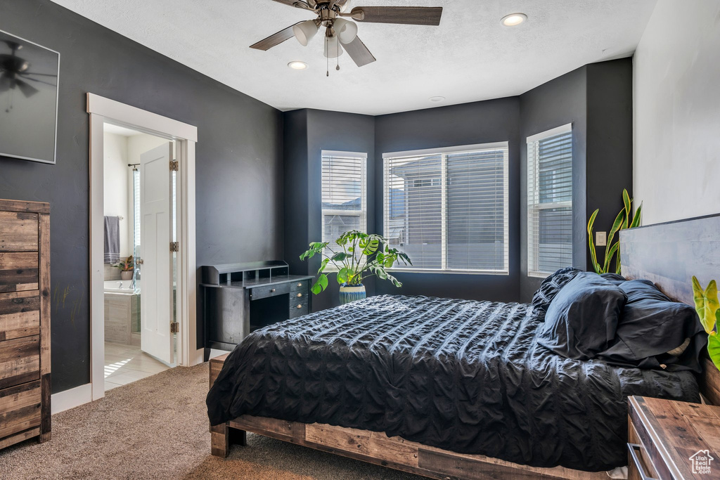 Bedroom featuring carpet floors, recessed lighting, connected bathroom, and a ceiling fan