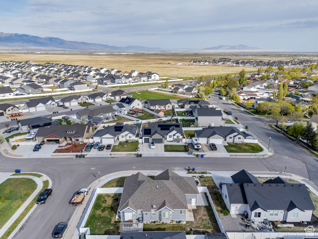 Drone / aerial view featuring a residential view and a mountain view