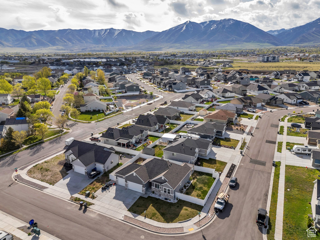 Aerial view featuring a mountain view and a residential view