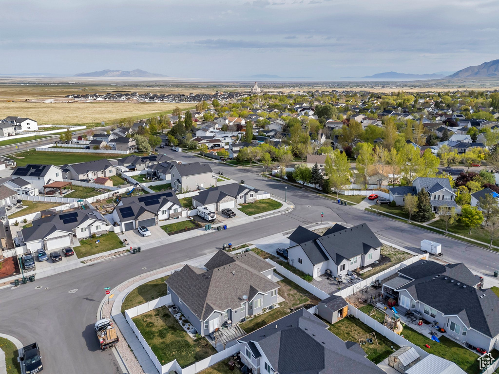 Drone / aerial view featuring a mountain view and a residential view