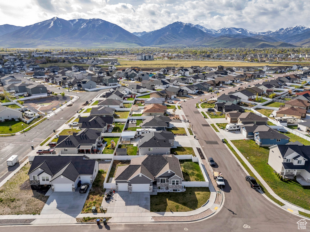 Drone / aerial view with a mountain view and a residential view