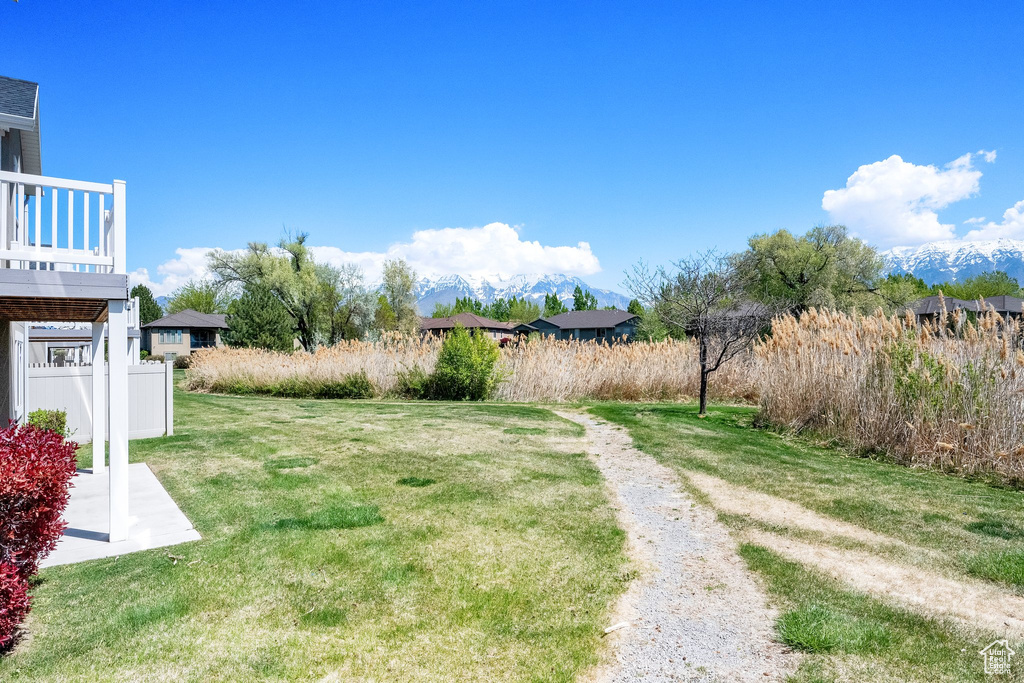 View of yard featuring fence