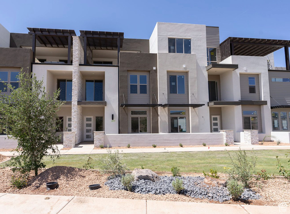 View of front of house with stucco siding