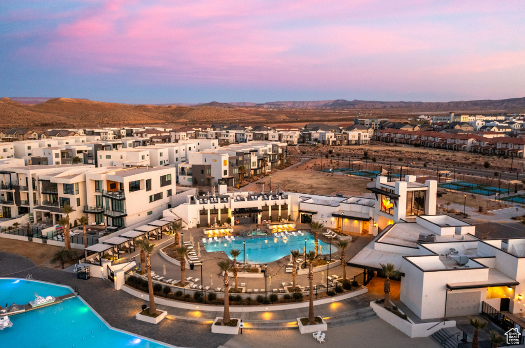 Bird's eye view of a pool and a mountain backdrop