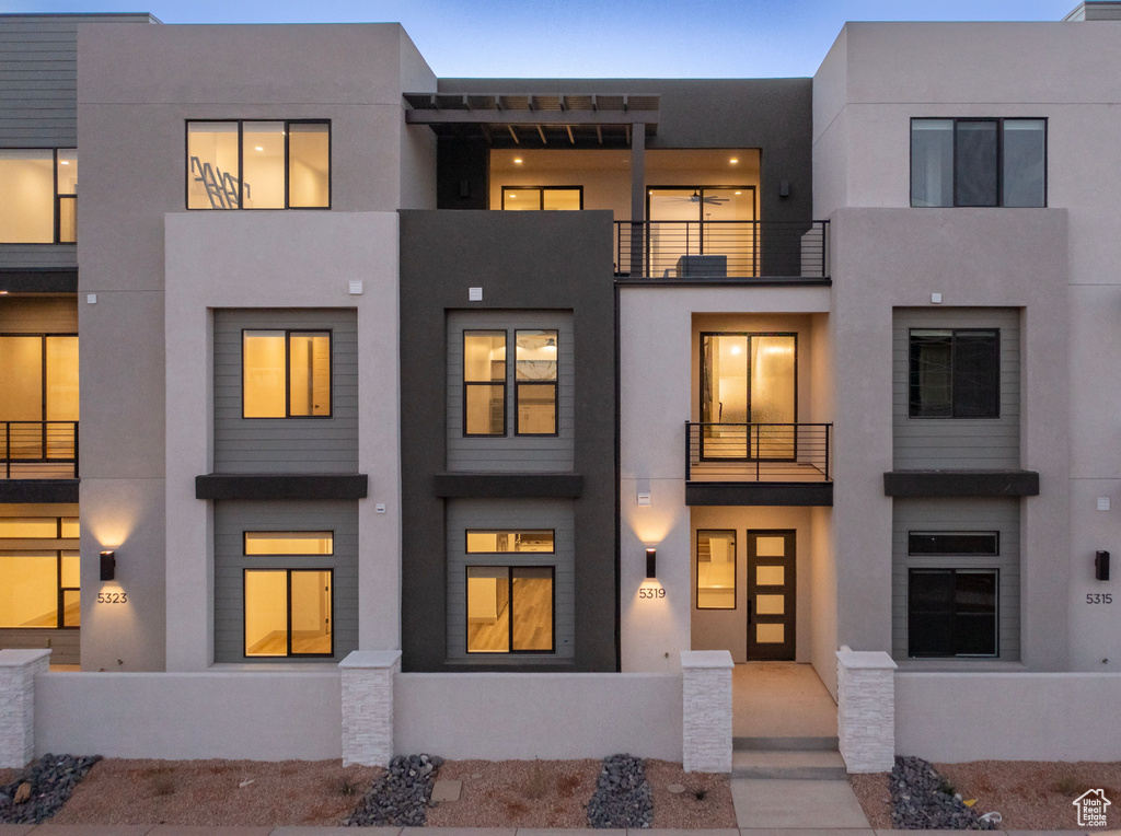 View of front of home with stucco siding
