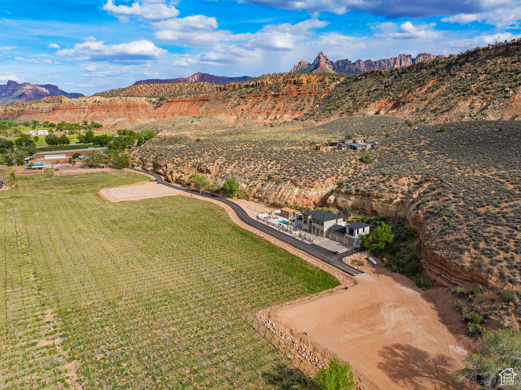 Birds eye view of property featuring a mountain view and a rural view