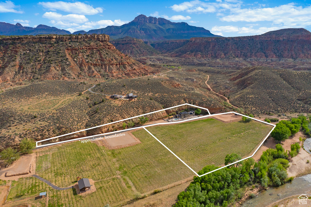 Drone / aerial view with a mountain view and a rural view