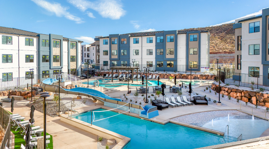 Community pool featuring a patio area