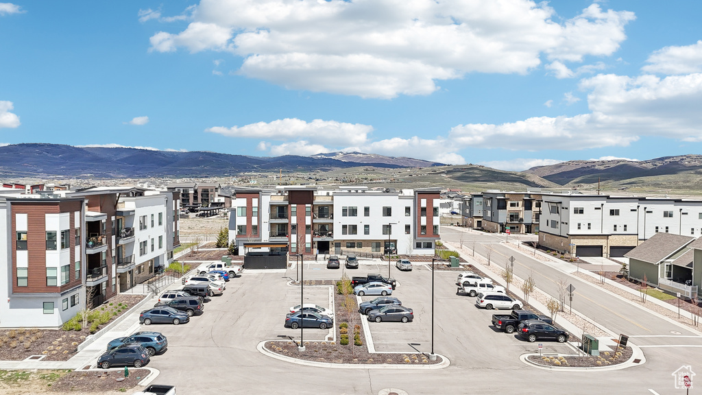 Birds eye view of property featuring a mountain view