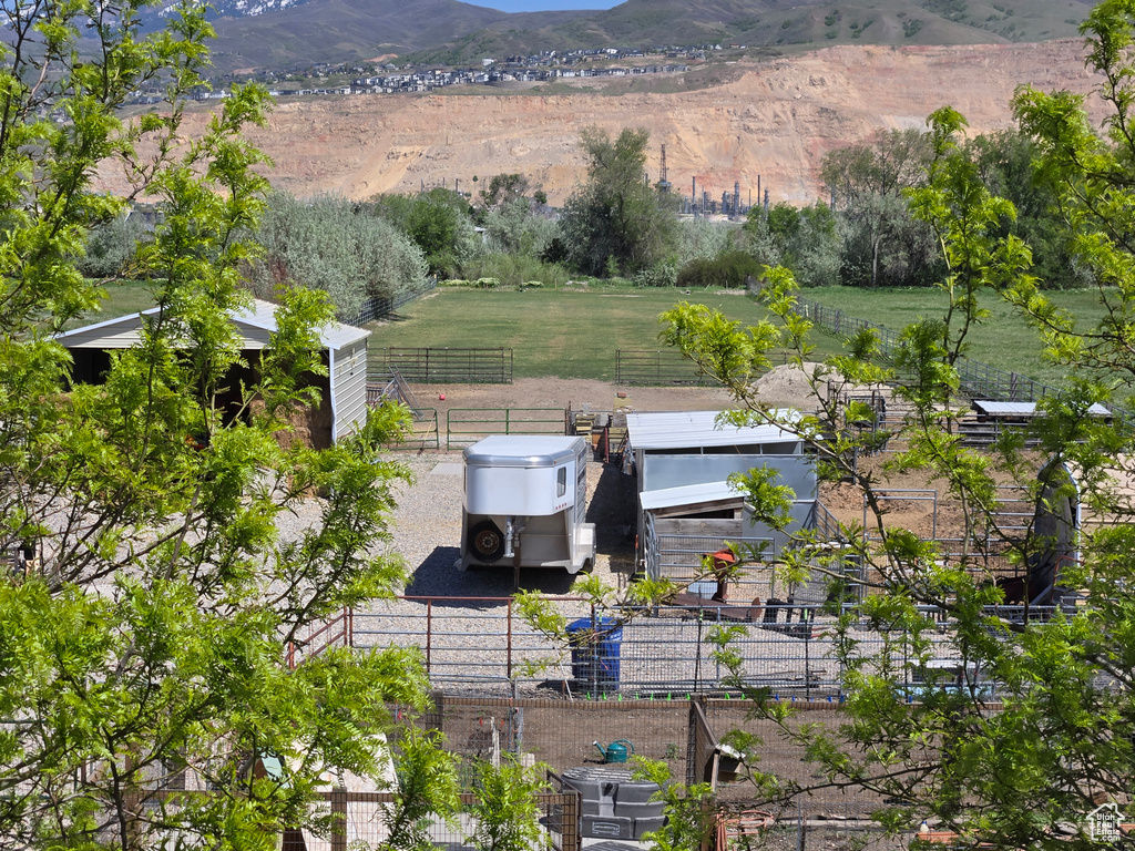 Birds eye view of property featuring a mountain view and a rural view