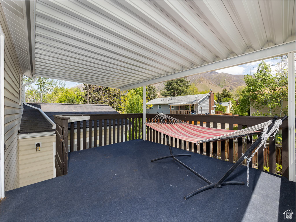 Wooden deck featuring a mountain view
