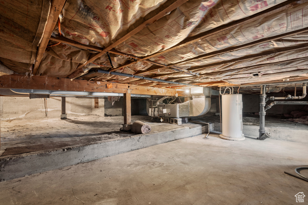 Basement featuring water heater