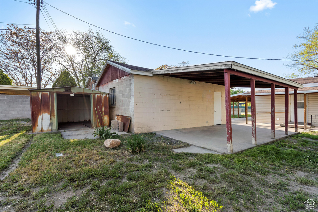 View of shed featuring a carport