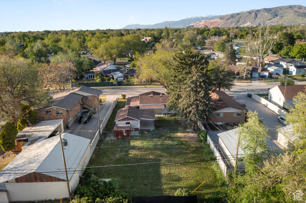 Birds eye view of property featuring a residential view and a mountain view