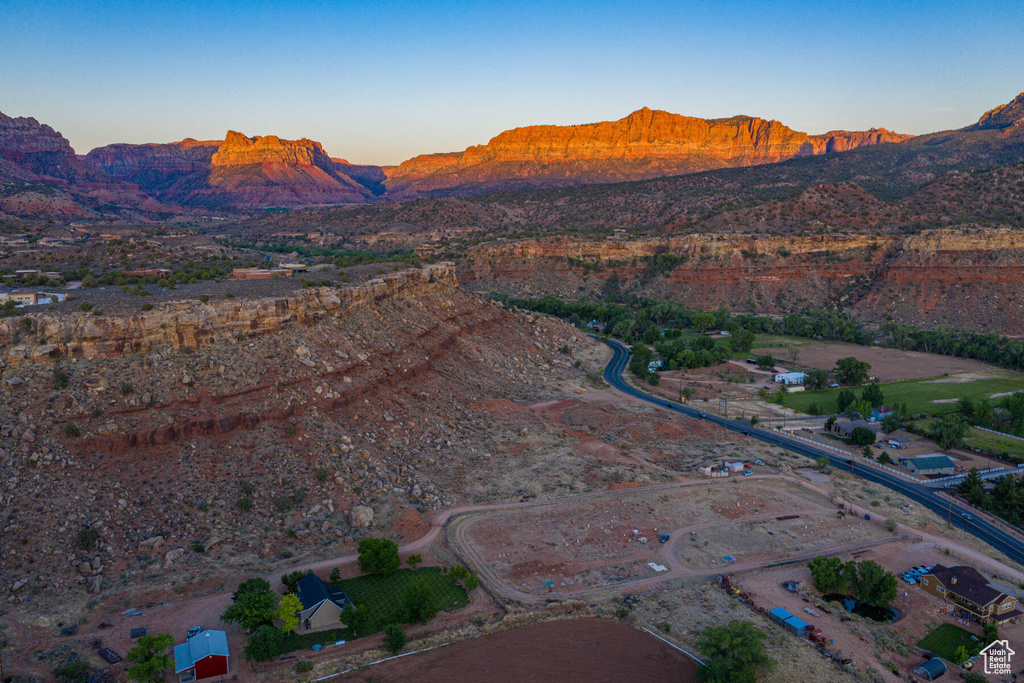Birds eye view of property with a mountain view