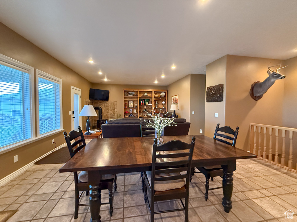 Dining room featuring baseboards and recessed lighting