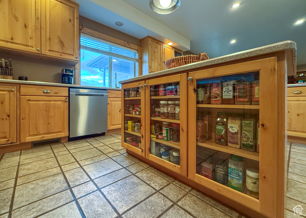 Kitchen featuring visible vents, light brown cabinetry, dishwasher, light countertops, and recessed lighting