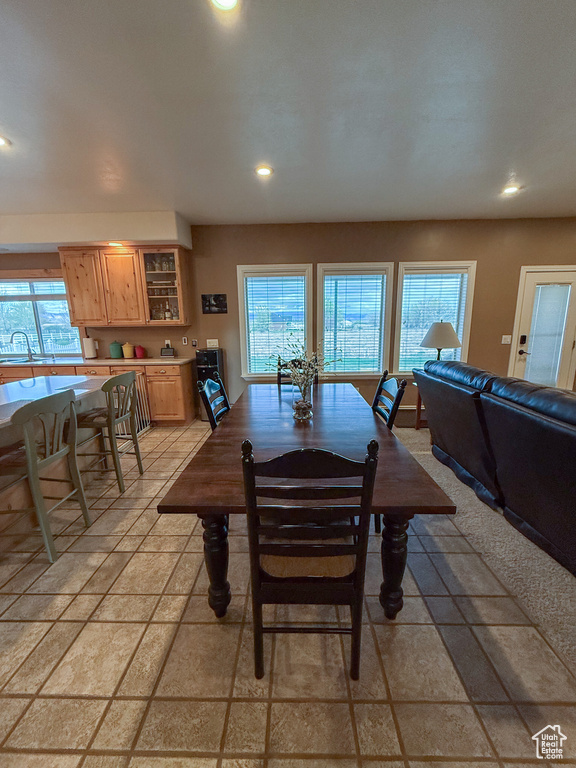 Dining room featuring recessed lighting and a healthy amount of sunlight