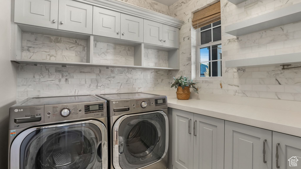Washroom with independent washer and dryer and cabinet space