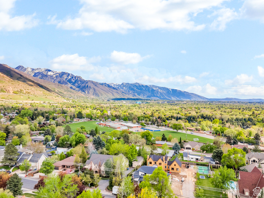 Drone / aerial view with a mountain view and a residential view