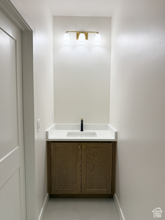 Bathroom with baseboards and vanity