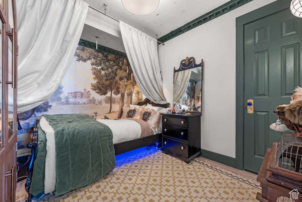 Bedroom with tile patterned floors