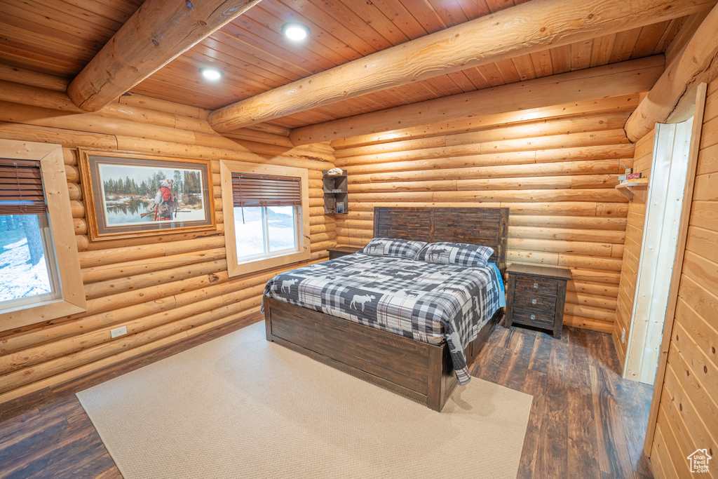 Bedroom featuring beamed ceiling, wood-type flooring, wood ceiling, and recessed lighting