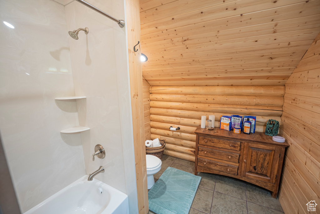 Full bathroom featuring vaulted ceiling, shower / tub combination, wooden ceiling, toilet, and log walls