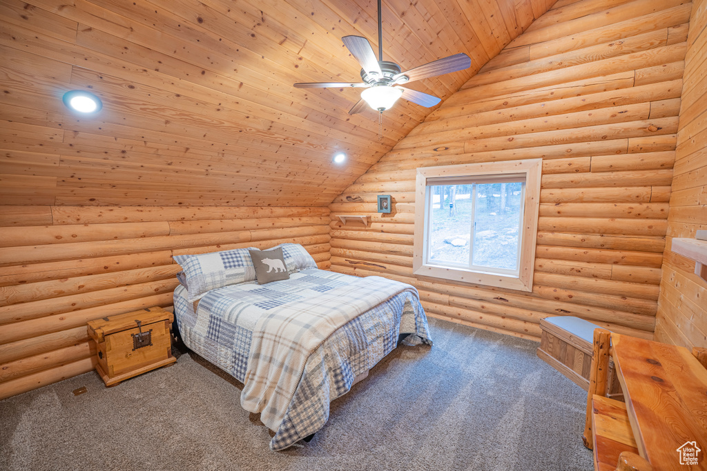 Bedroom featuring wood ceiling, vaulted ceiling, carpet floors, log walls, and recessed lighting