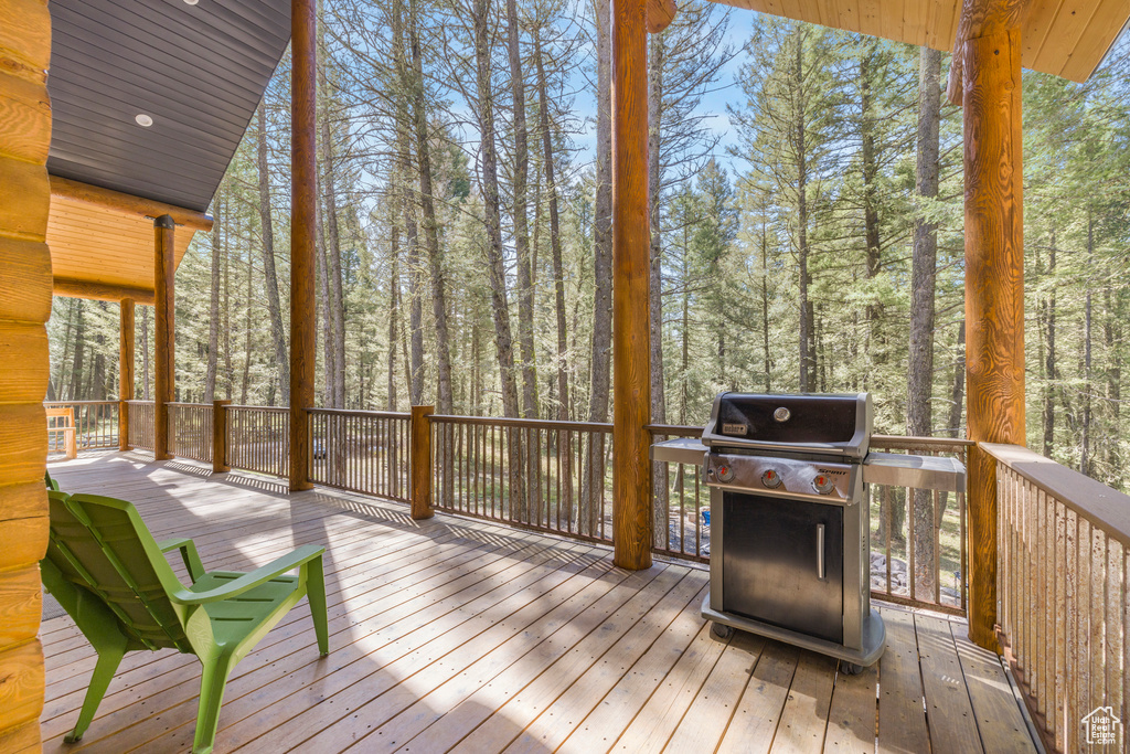 Wooden terrace with a grill