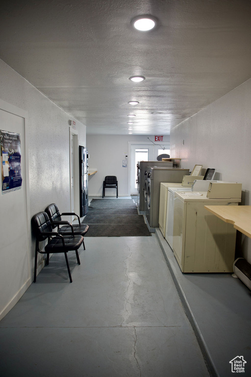 Shared laundry area featuring recessed lighting, baseboards, and washing machine and dryer